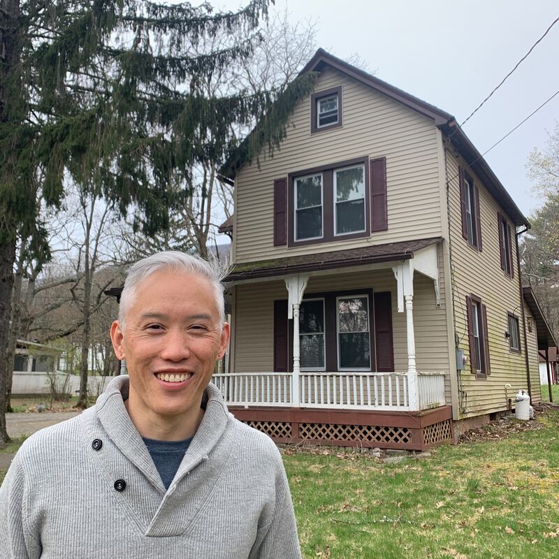 Standing in front of the house after closing, early spring